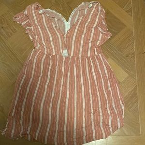 I am selling a beautiful coral dress!! The dress size is a large!!